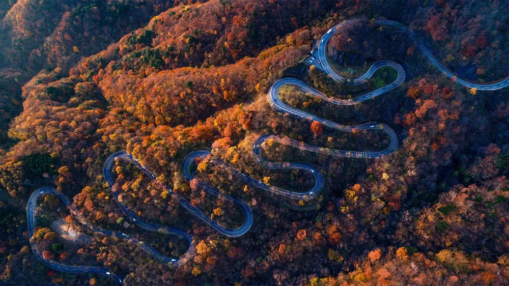 Irohazaka Winding Road in Nikko, Japan, fall foliage.